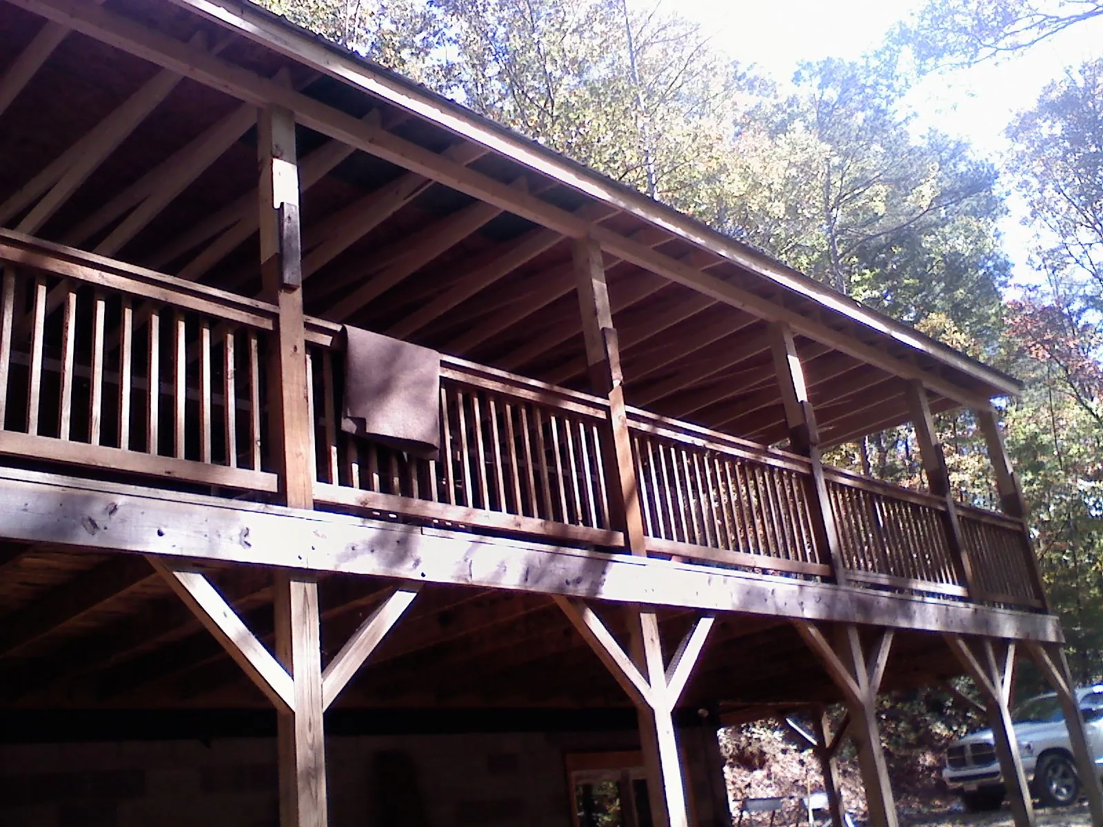 Timber framing under a new elevated porch and deck — Roof Leak Repair in Dacono by Roofing Brothers